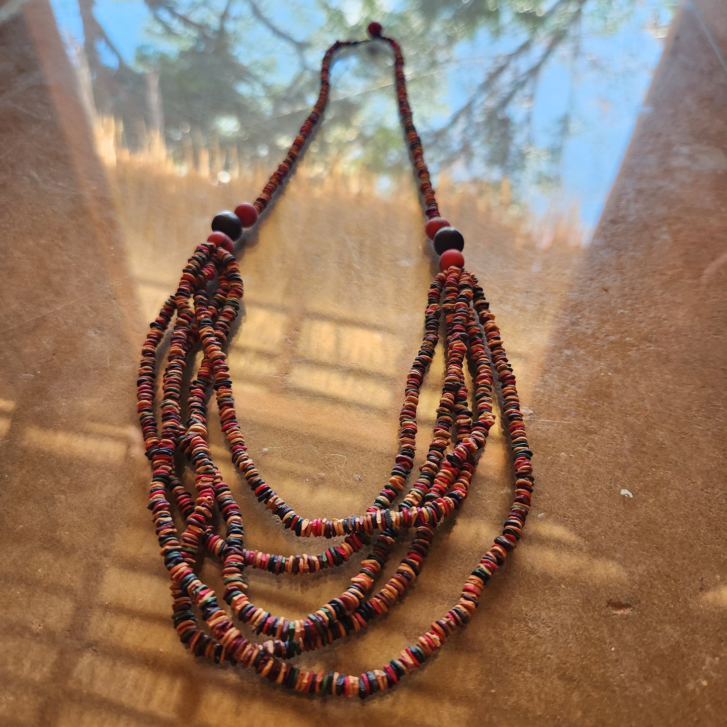 Collier graines morototo multicolores et 3 graines açai et saboneteira