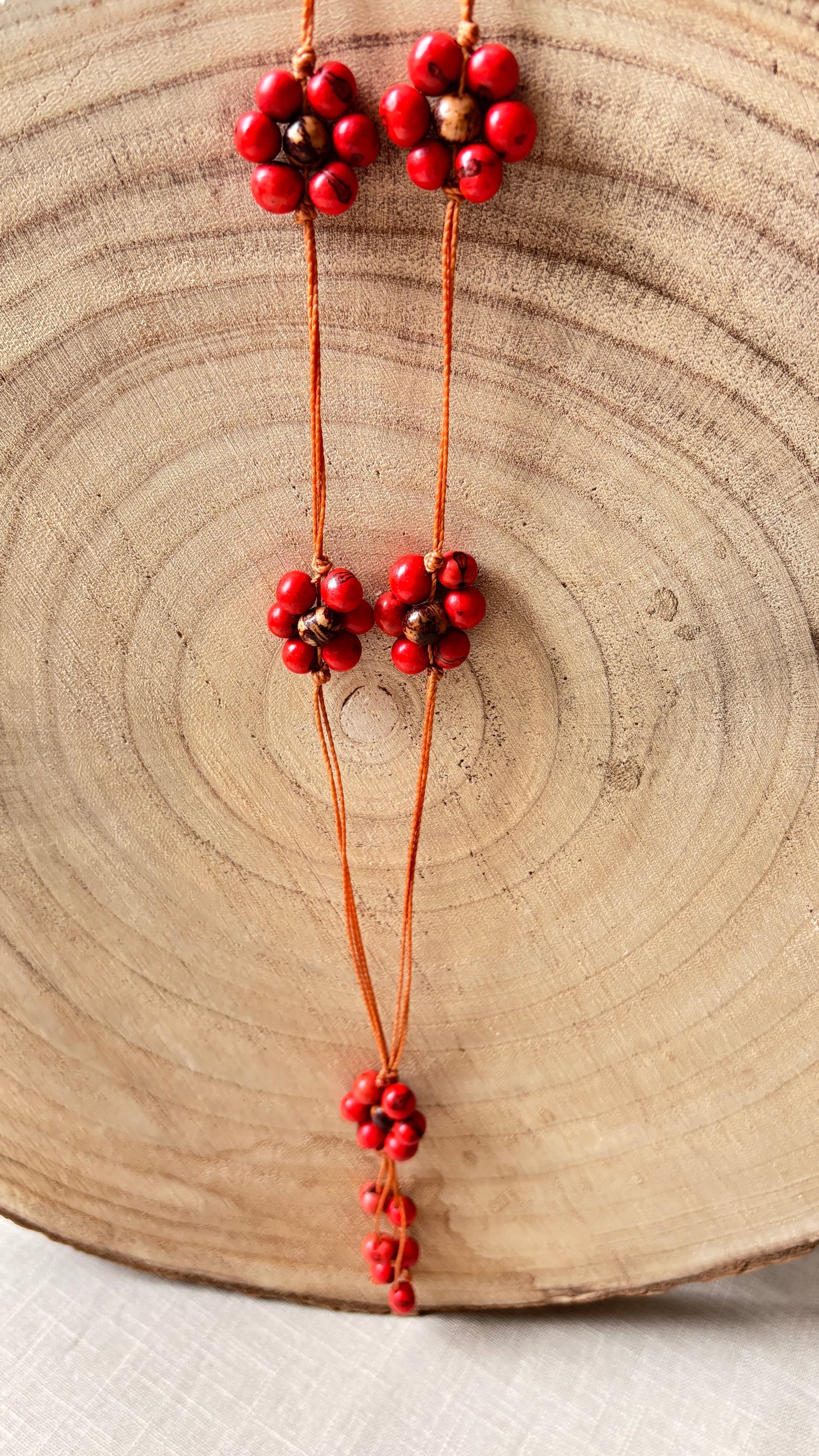 Collier de graines d'açai rouges 7 fleurs - Ethnie Borari