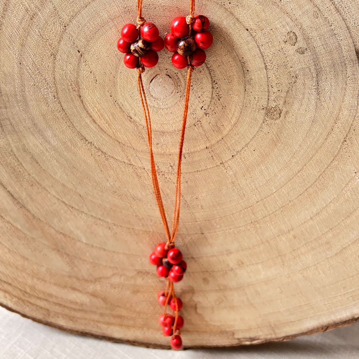 Collier de graines d'açai rouges 7 fleurs - Ethnie Borari