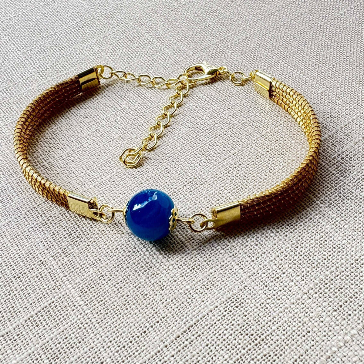 Pulseira Capim Dourado - pedra natural Ágata azul