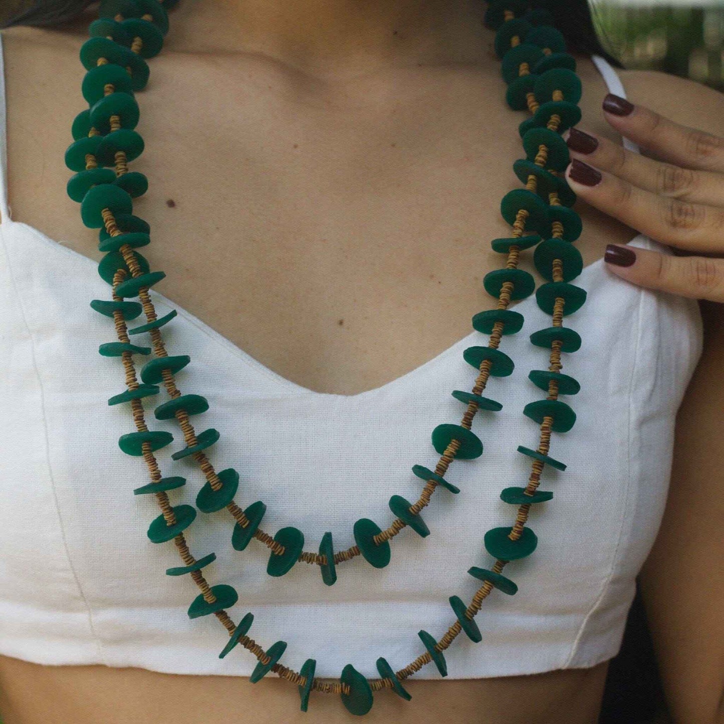 Collier de graines de morototo naturelles et latex vert