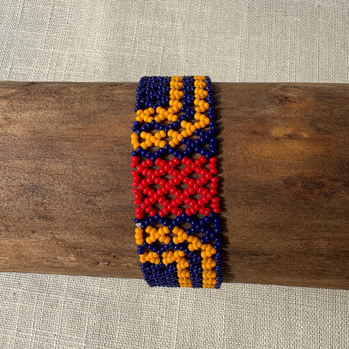 Par de pulseiras em contas de vidro (Miçanga) - fino azul vermelho e amarelo