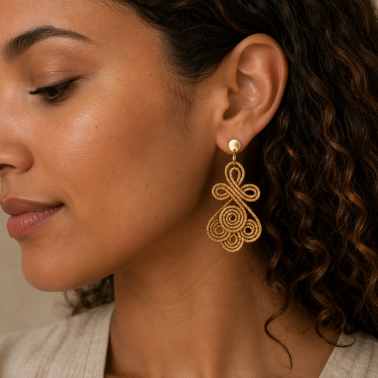 Boucles d'oreilles capim dourado quatre spirales superposées