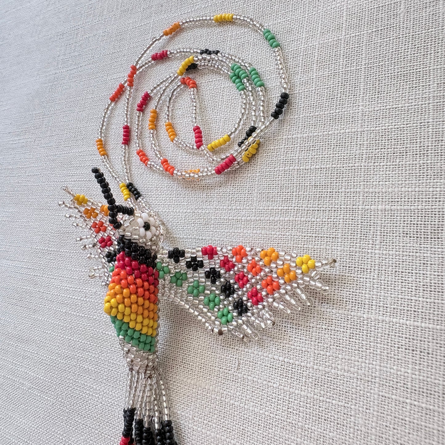 Collier en perles de verre - Colibri argenté