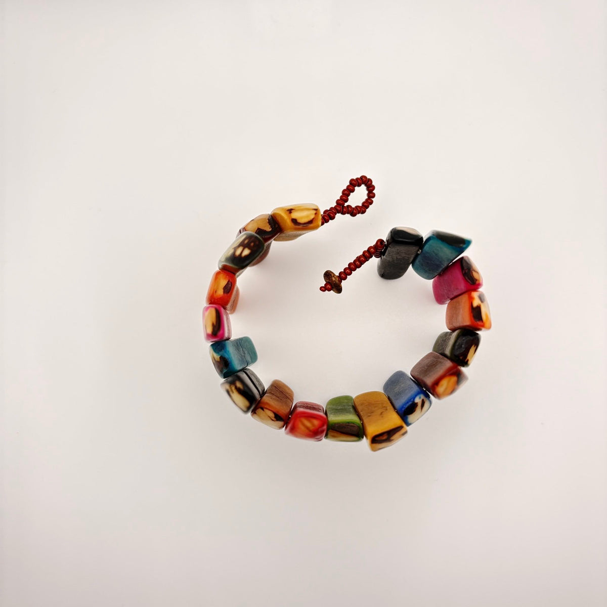 Pulseira de contas de vidro e sementes naturais de jarina 1