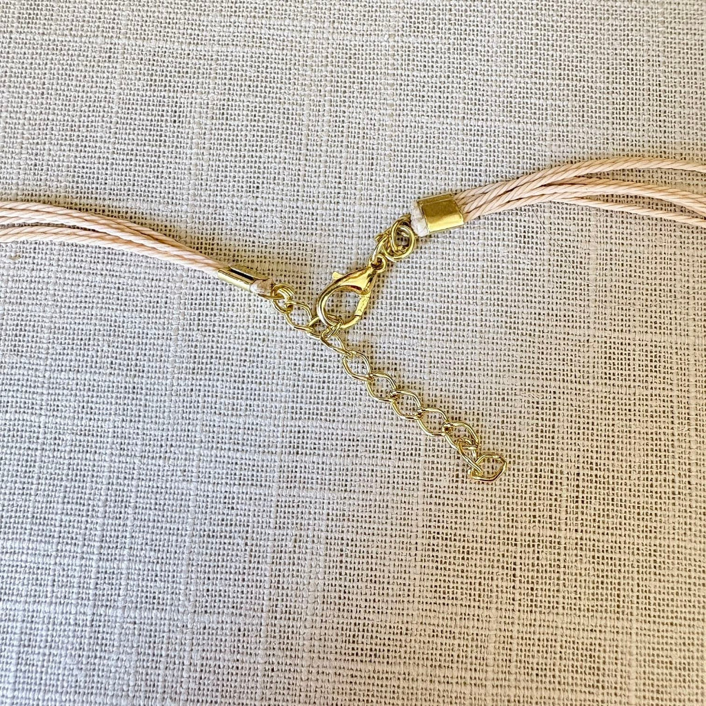 Parure Capim Dourado et buriti vert - symbole Infini