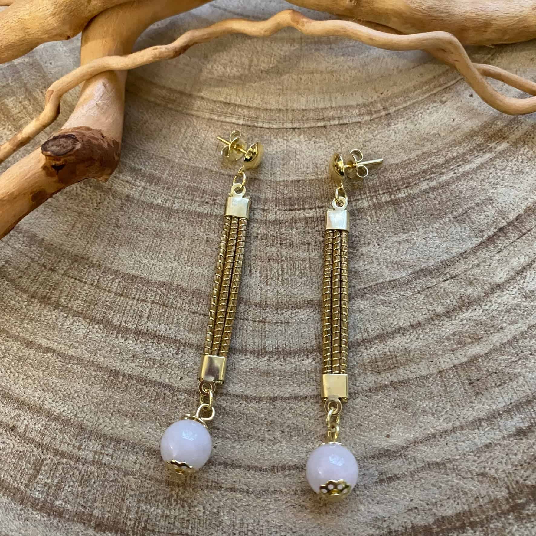Boucles d'oreilles Capim Dourado lignes et pierre naturelle quartz rose Boucles d'oreilles Artisan local travaillant le Capim Dourado dans l'état du Tocantins au centre-est du Brésil 