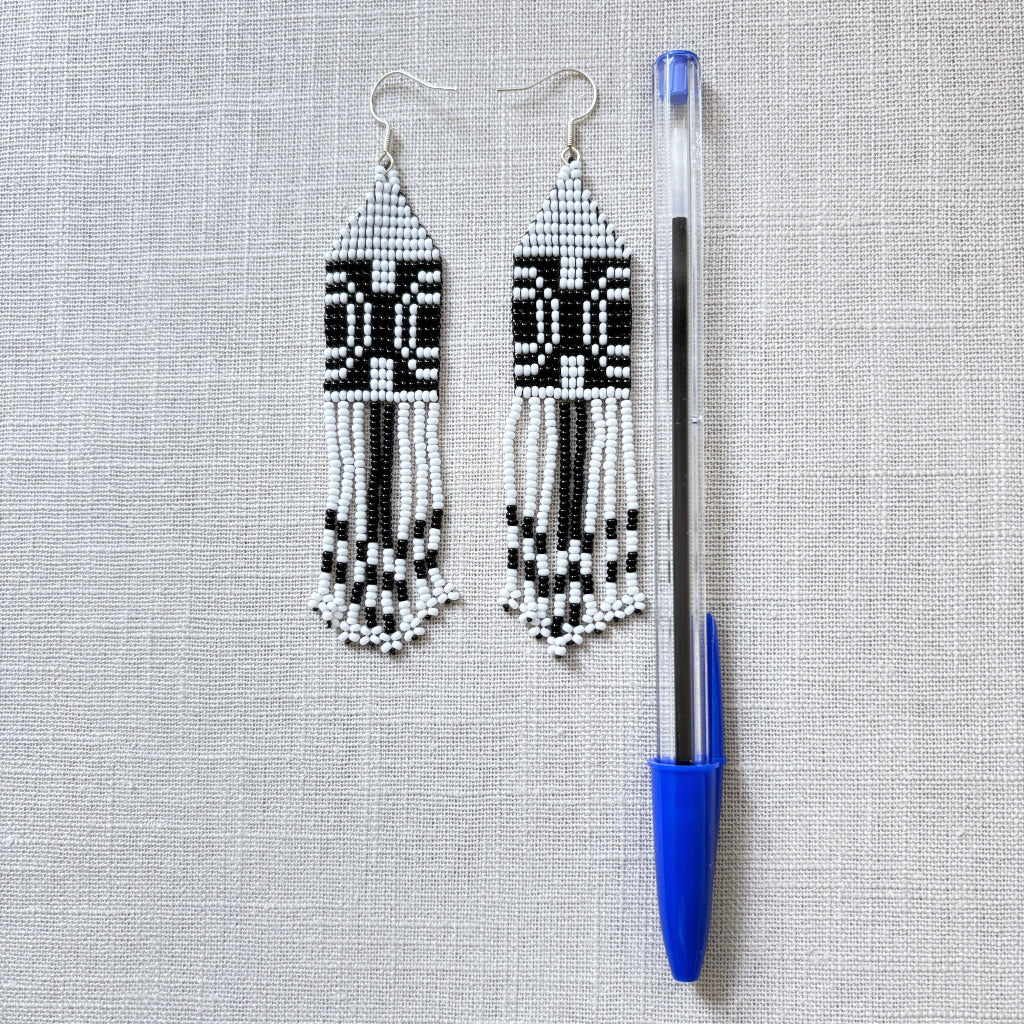 boucles oreilles graphisme blanc