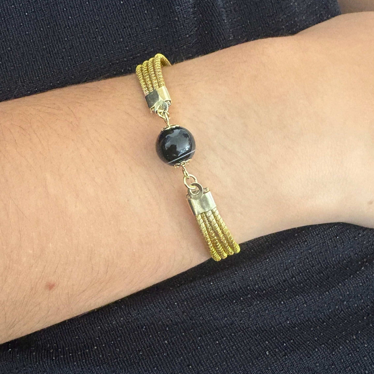 Bracelet Capim Dourado - pierre naturelle Agate noire Bracelet Artisan local travaillant le Capim Dourado dans l'état du Tocantins au centre-est du Brésil 