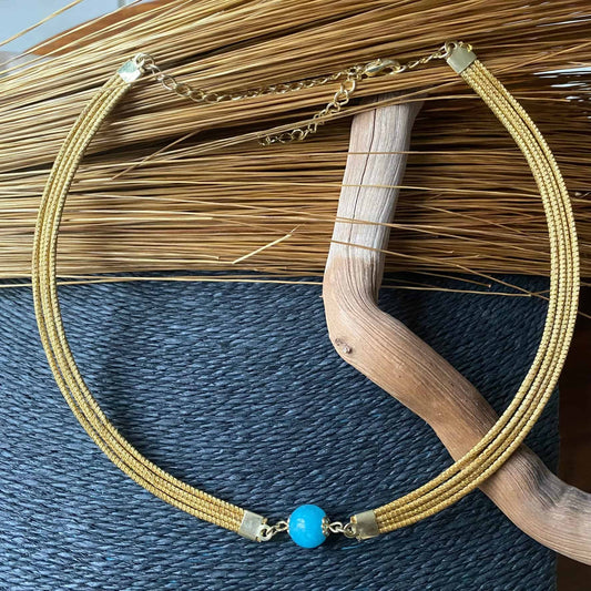 Collier Capim Dourado 4 lignes - pierre naturelle amazonite bleue Collier Artisan local travaillant le Capim Dourado dans l'état du Tocantins au centre-est du Brésil 