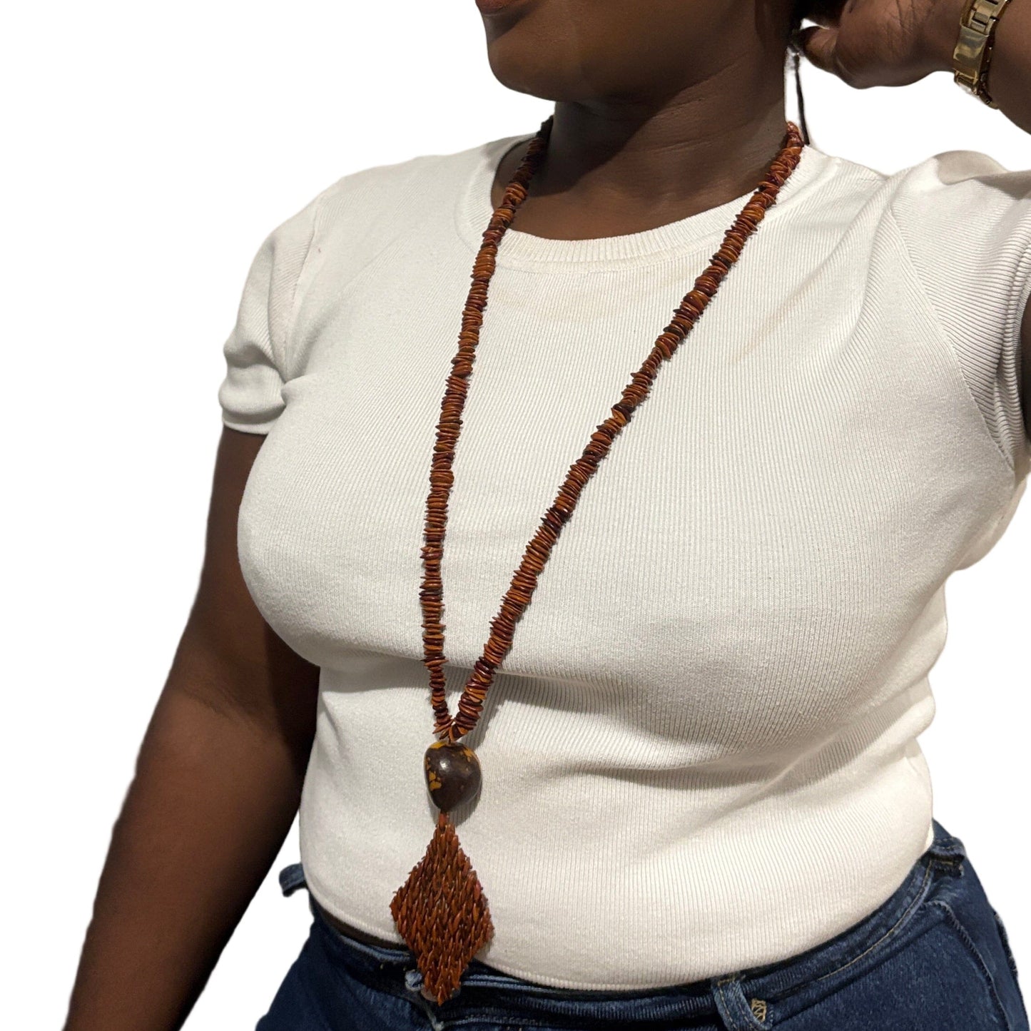 Collier sautoir graines jueirana avec pendentif en jarina - Ethnie Pataxo Collier Ethnie Pataxo, localisée dans l'état de Bahia à l'Est du Brésil. 